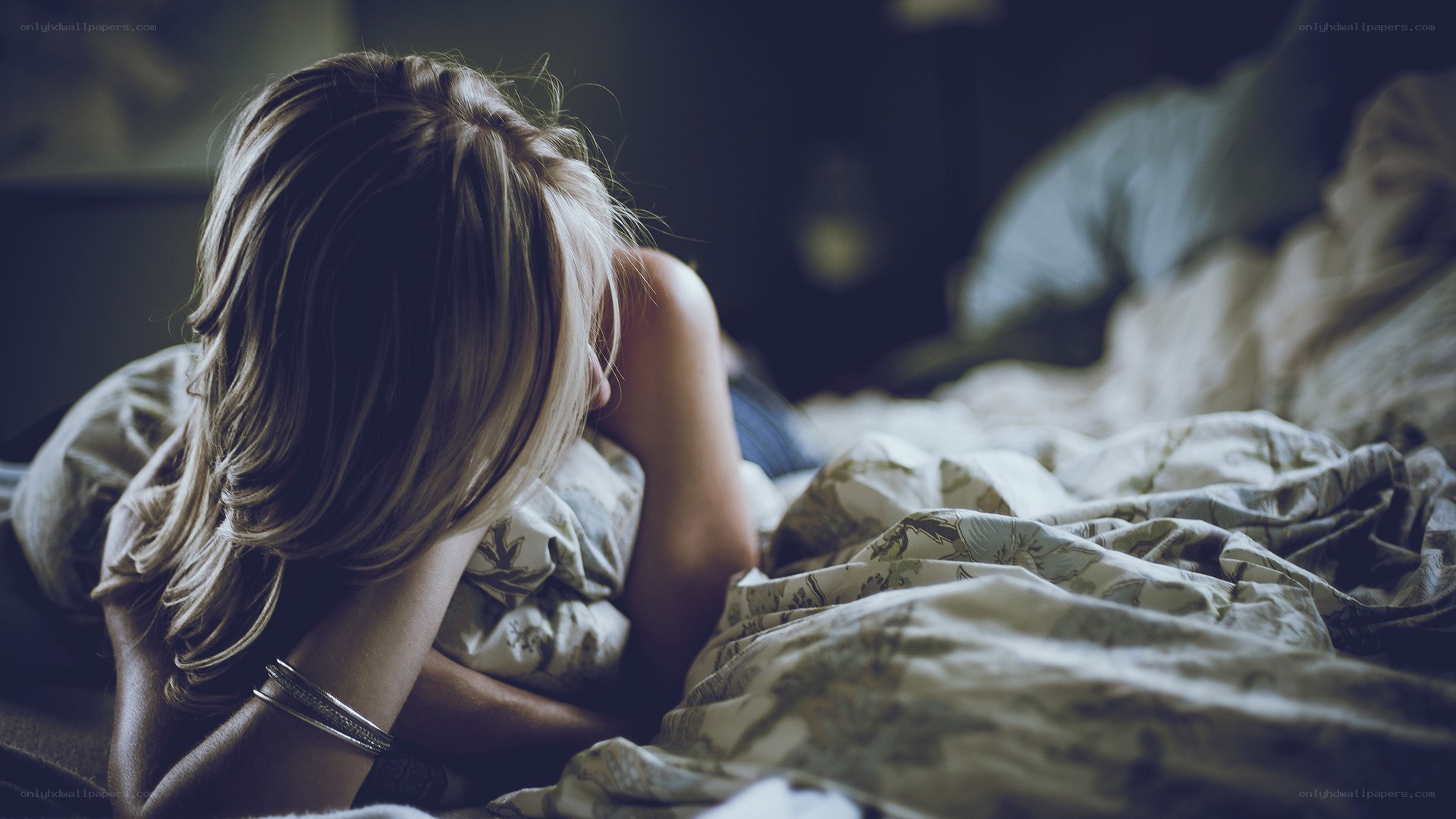 woman lying in bed