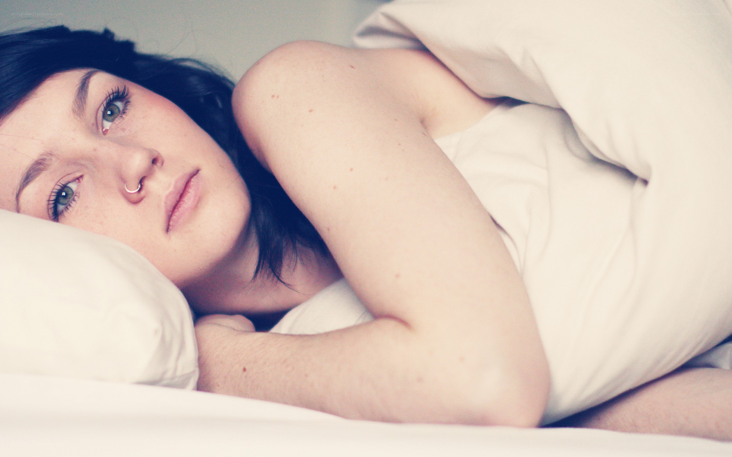 woman lying in bed