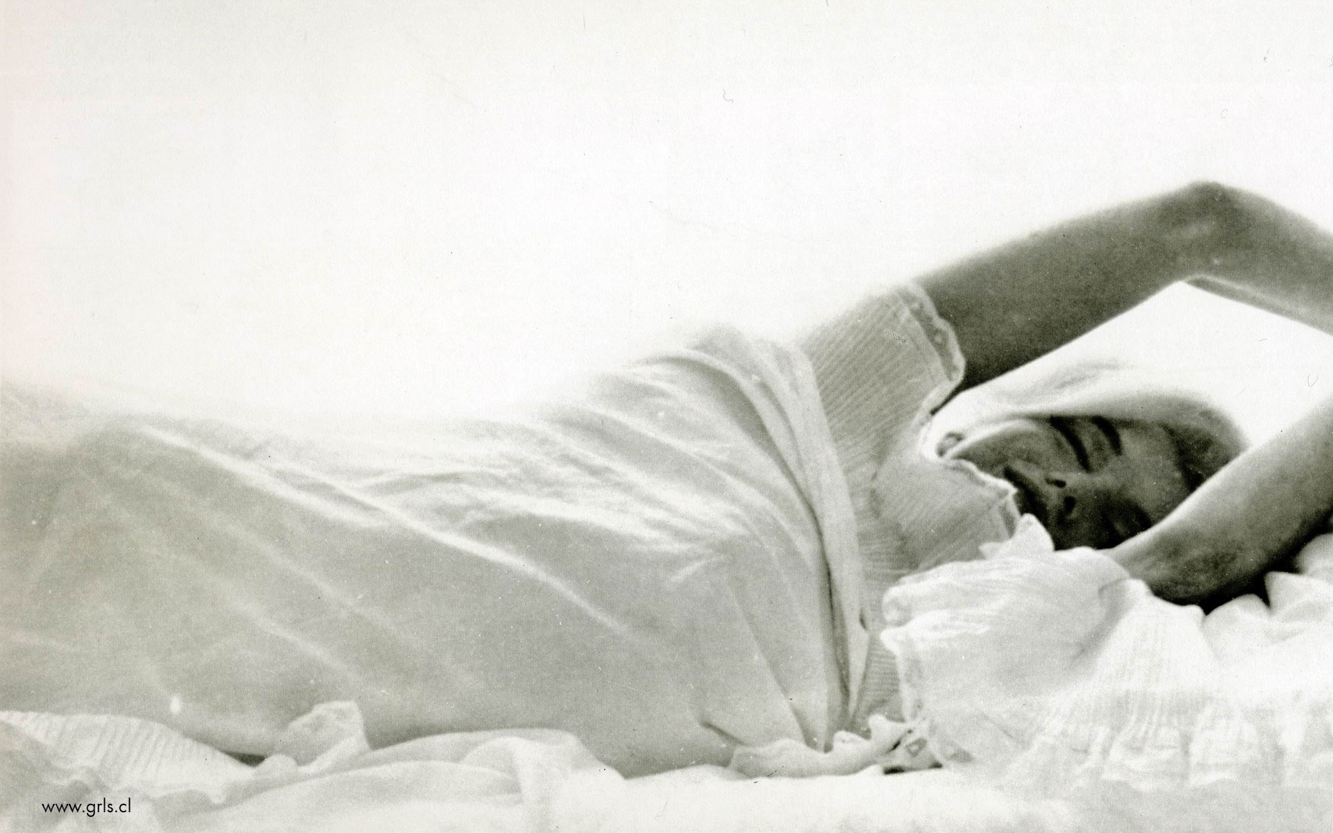 woman lying in bed
