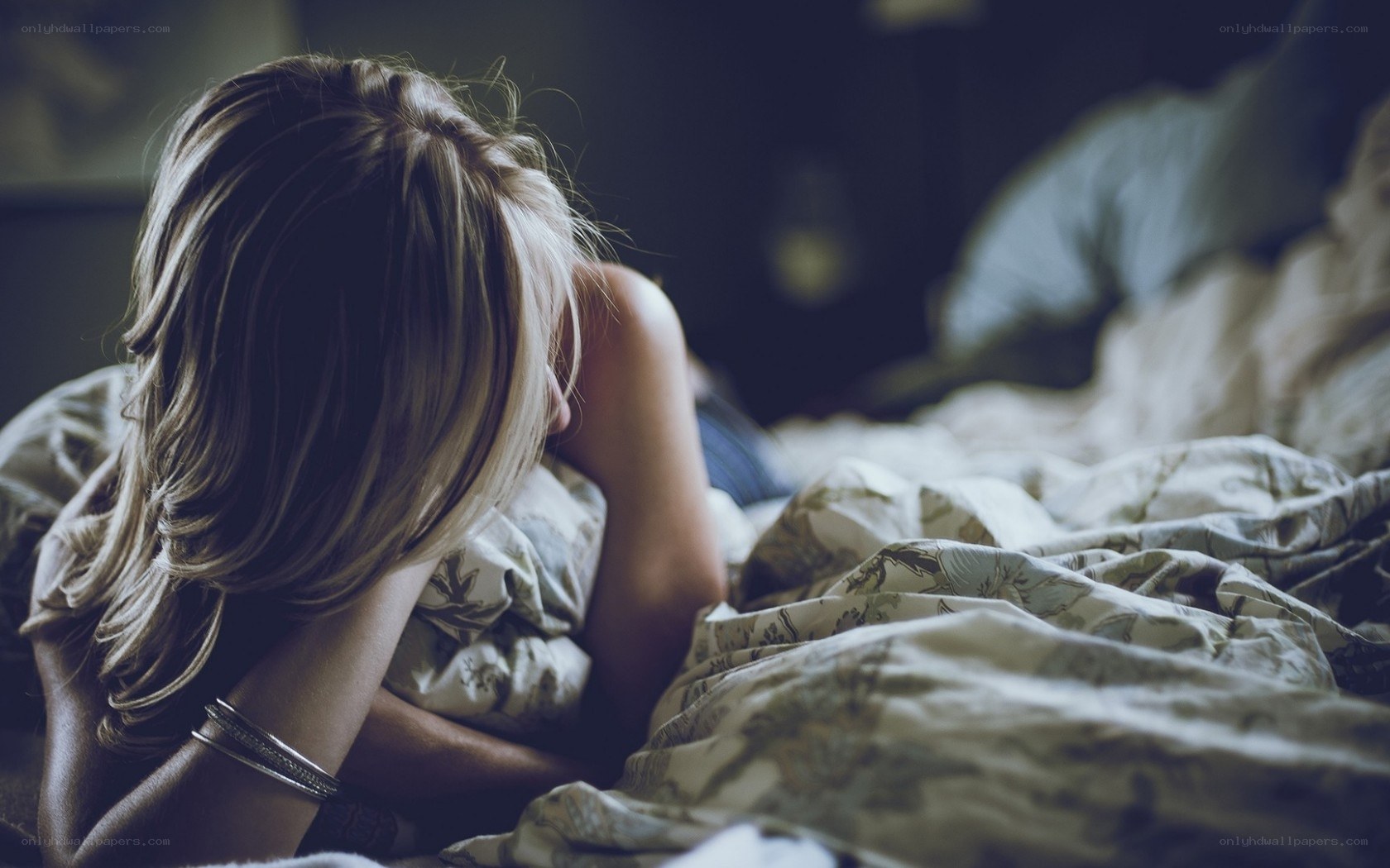 woman lying in bed