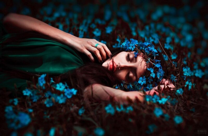 Woman Lying in Blue Flowers — Serene