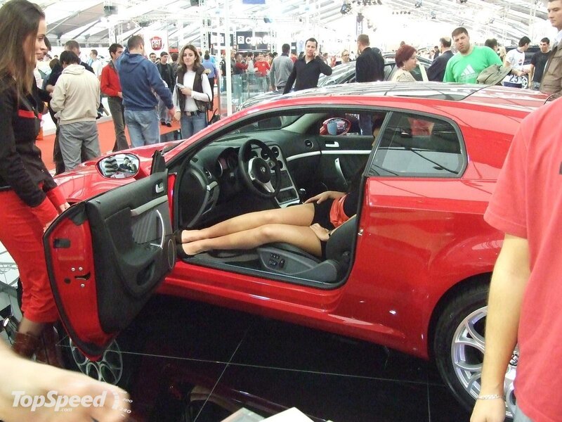 Woman Lying in Car — Red