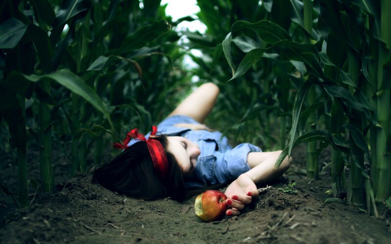 Woman Lying in Cornfield — Green