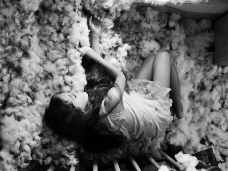 Woman Lying in Cotton