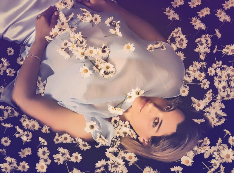 Woman Lying in Daisies — Blue