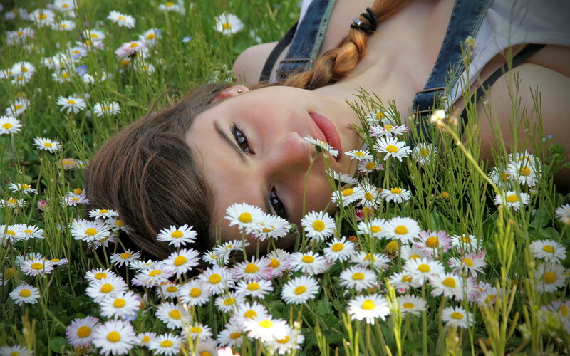 Woman Lying in Daisies
