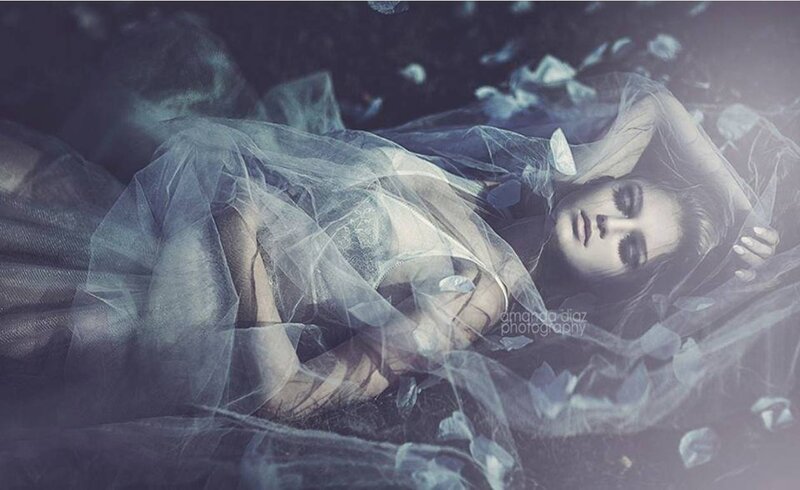 Woman Lying in Fabric — Blue