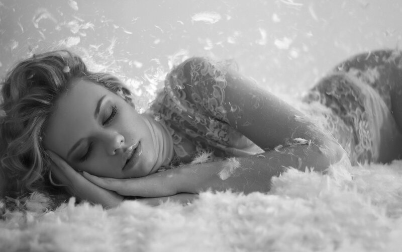 Woman Lying in Feathers — Black
