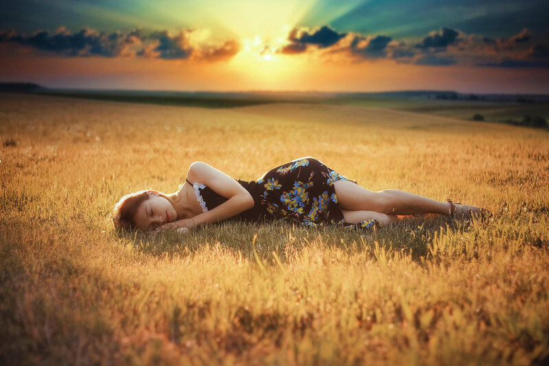 Woman Lying in Field — Gold