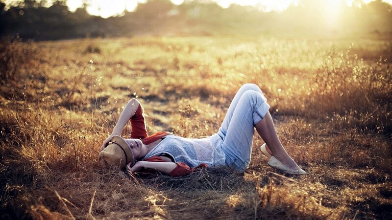Woman Lying in Field — Golden, Serene