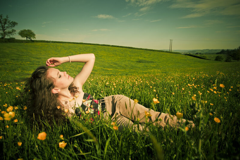 Woman Lying in Field — Green, Serene