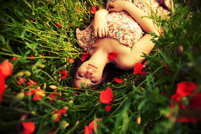 Woman Lying in Field — Red