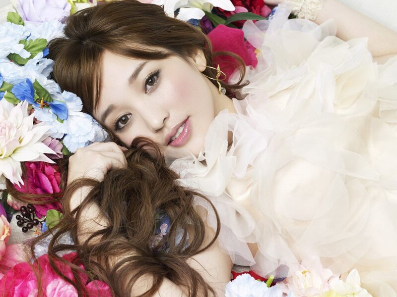 woman lying in flowers