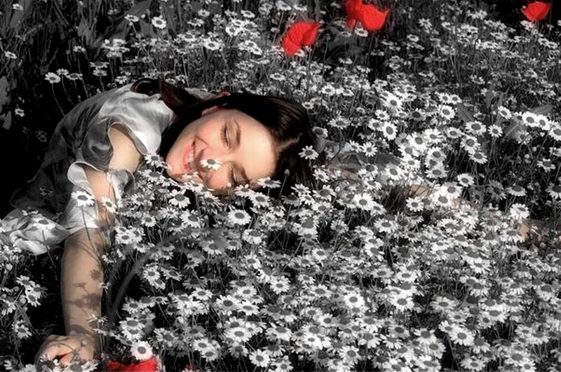 Woman Lying in Flowers — Black, Peaceful, Spring