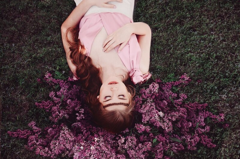 Woman Lying in Flowers — Pink, Serene, Spring, Photograph