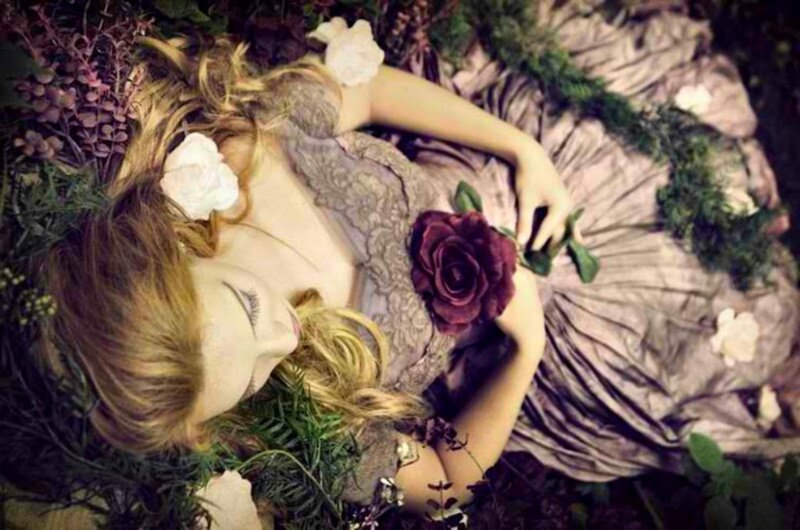 Woman Lying in Flowers — Purple, Serene, Photograph