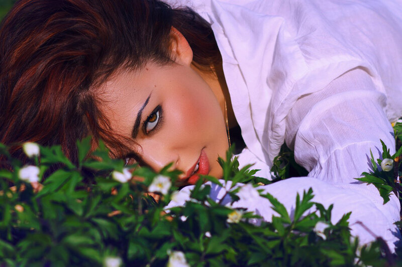 Woman Lying in Flowers — White, Calm