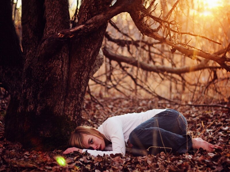 Woman Lying in Forest — Brown