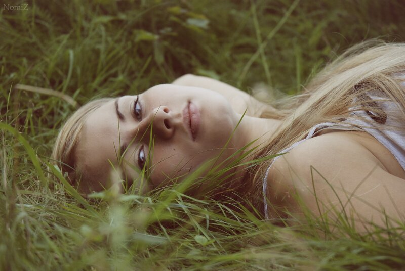 woman lying in grass