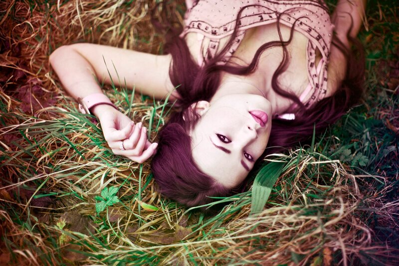 woman lying in grass