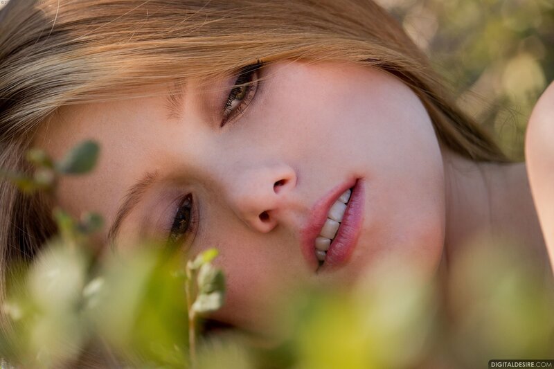 woman lying in grass