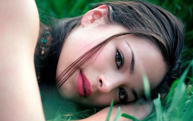 woman lying in grass