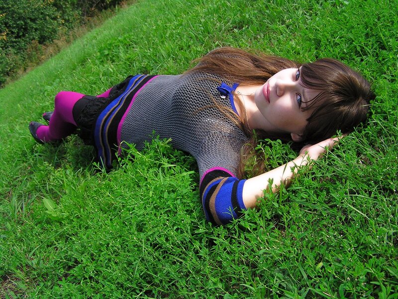Woman lying in grass
