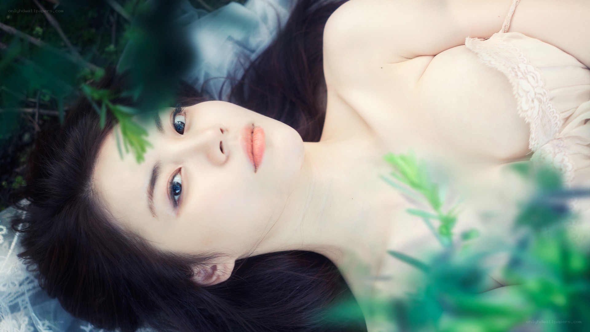 woman lying in grass