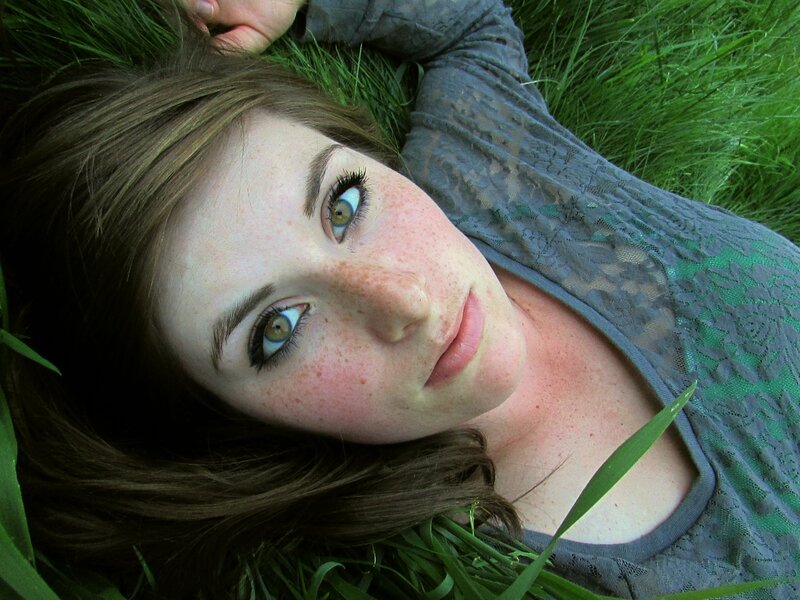 woman lying in grass