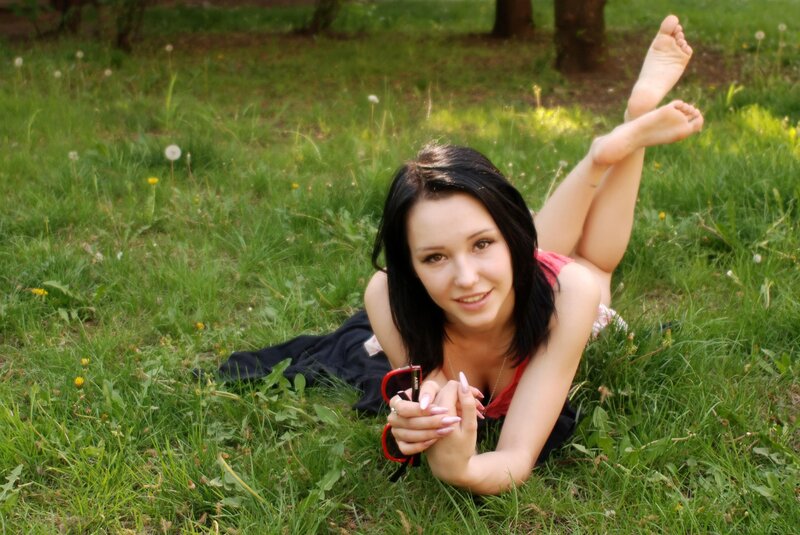 woman lying in grass