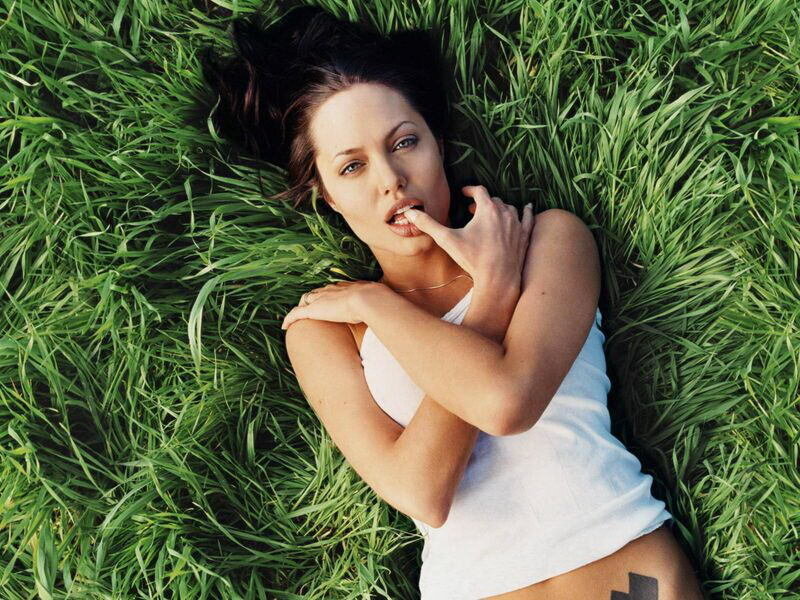woman lying in grass
