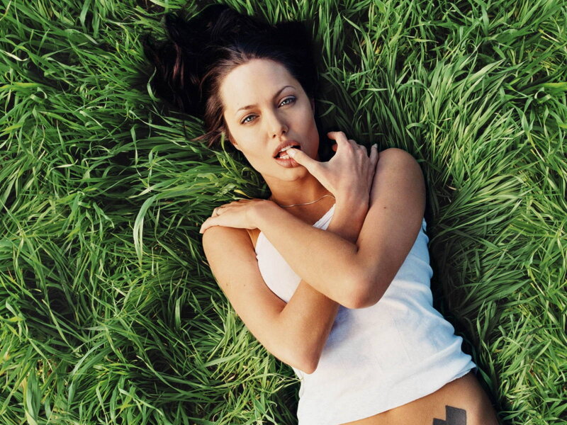 woman lying in grass