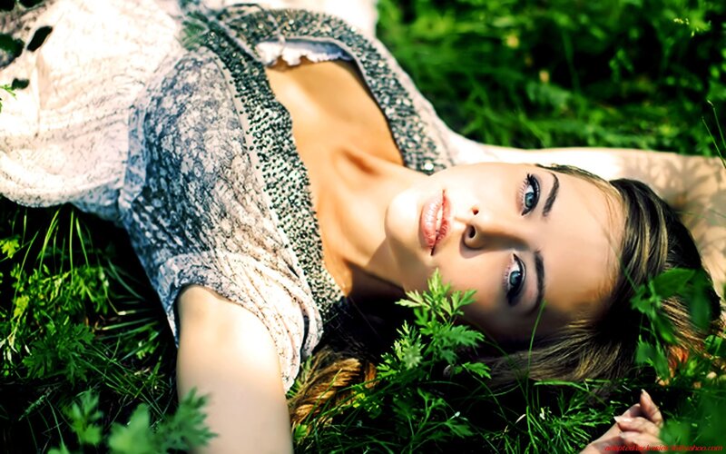 woman lying in grass