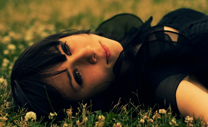 woman lying in grass