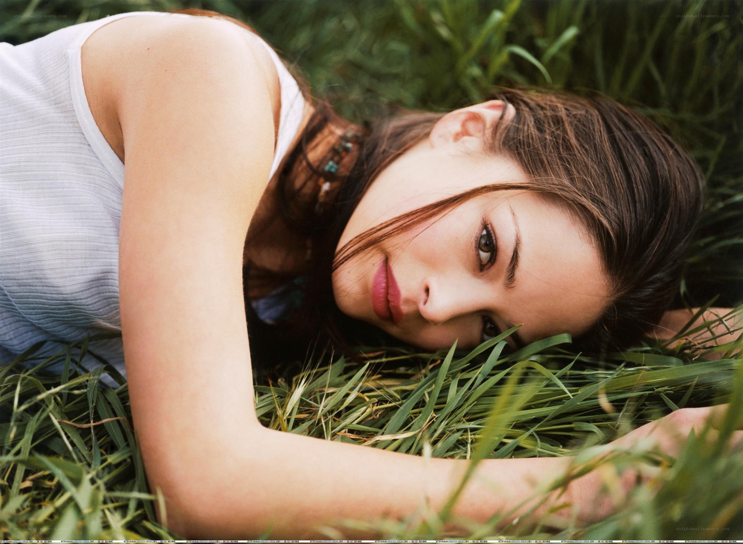 woman lying in grass