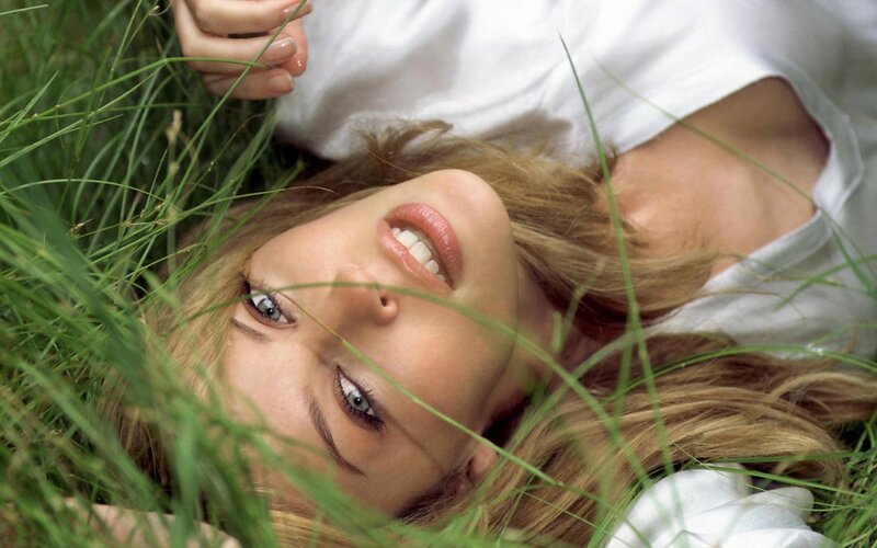 woman lying in grass
