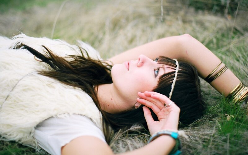 woman lying in grass