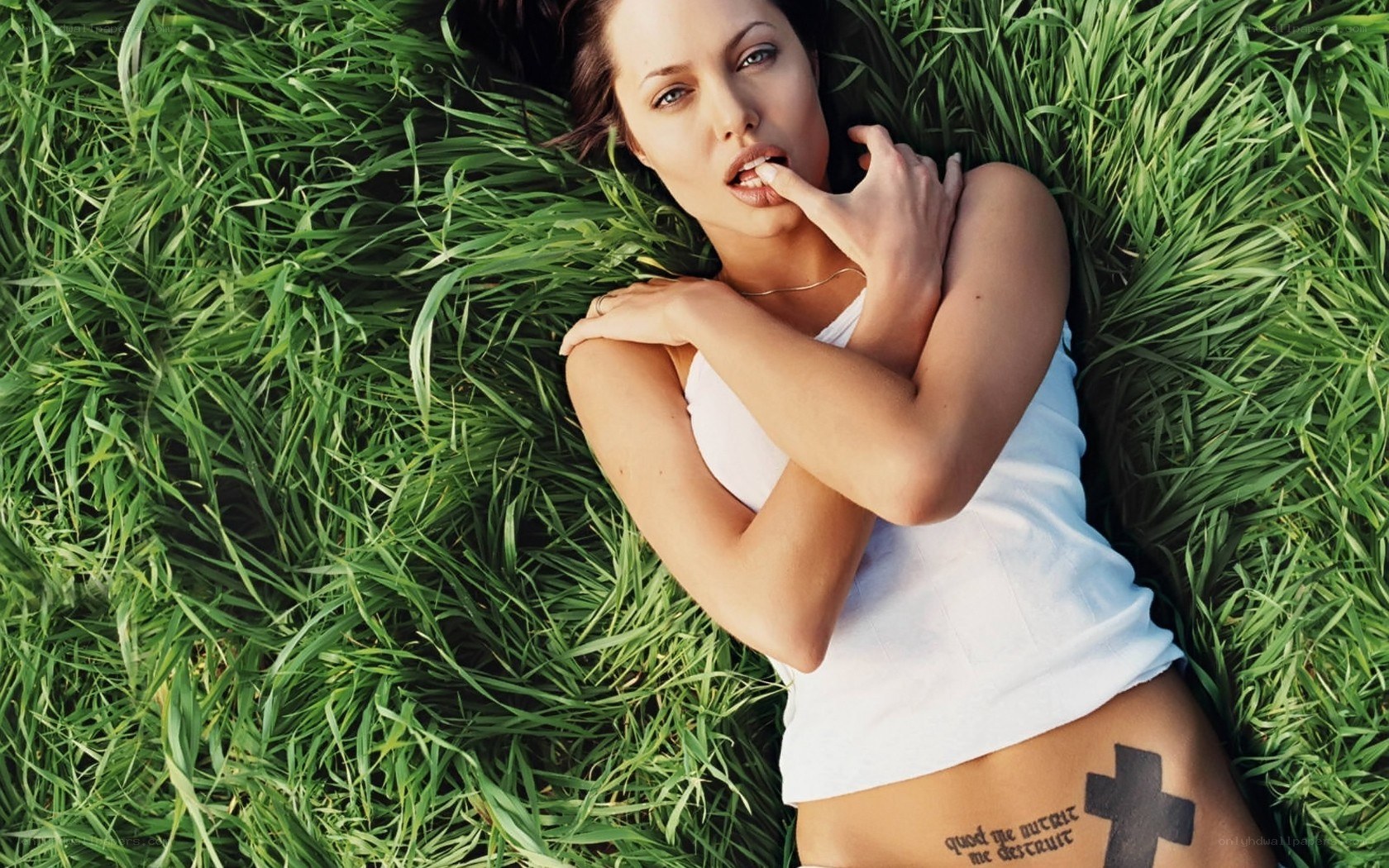 woman lying in grass