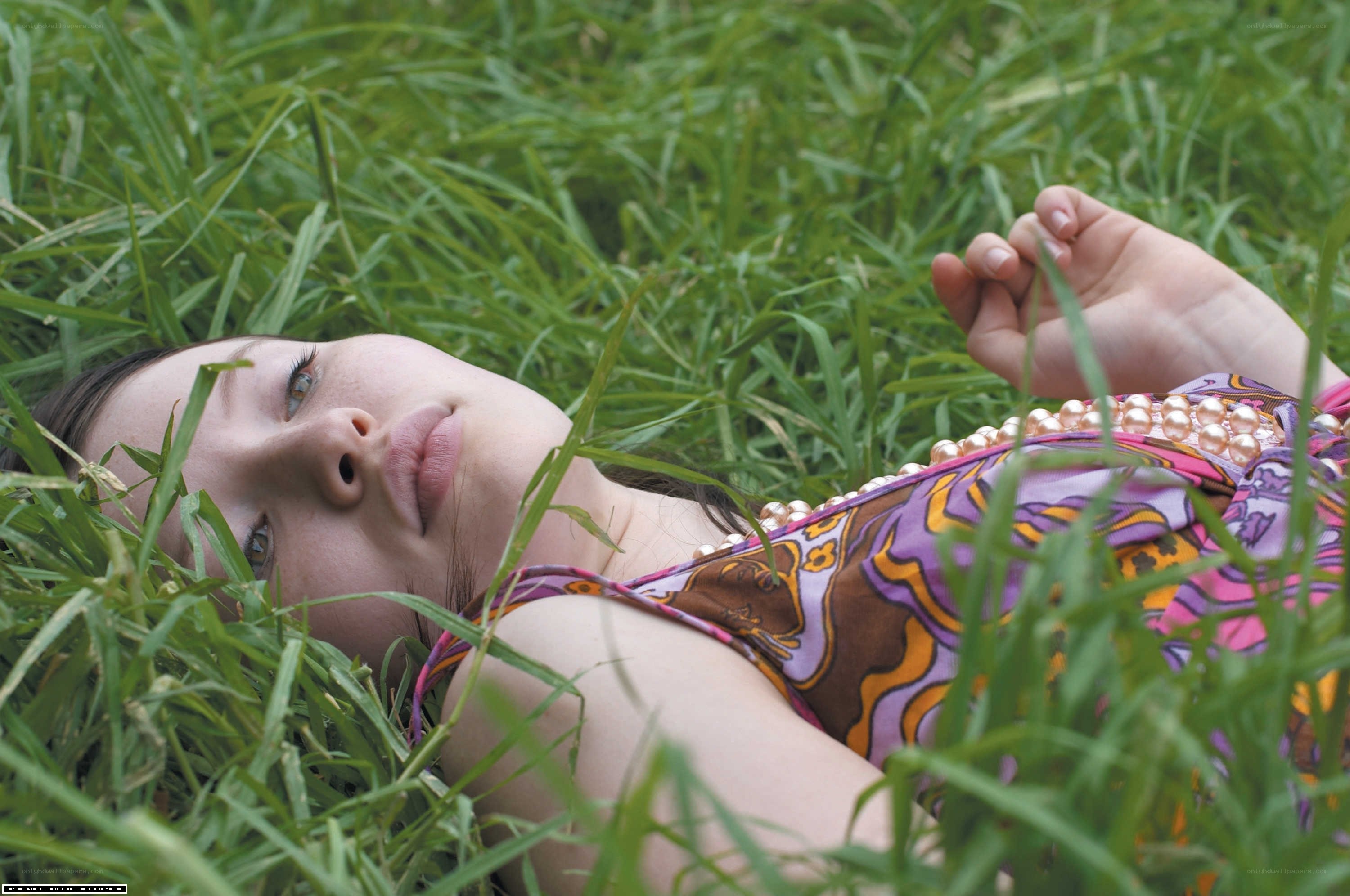 woman lying in grass