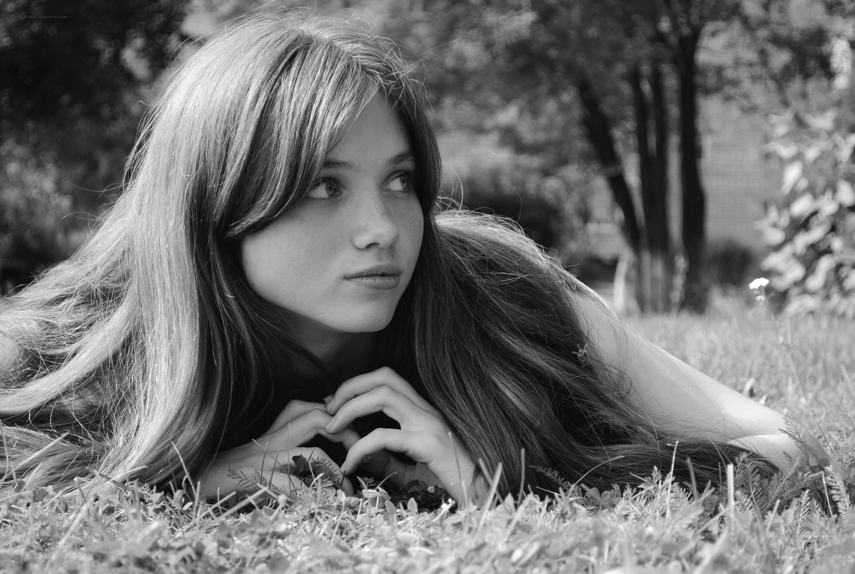 woman lying in grass