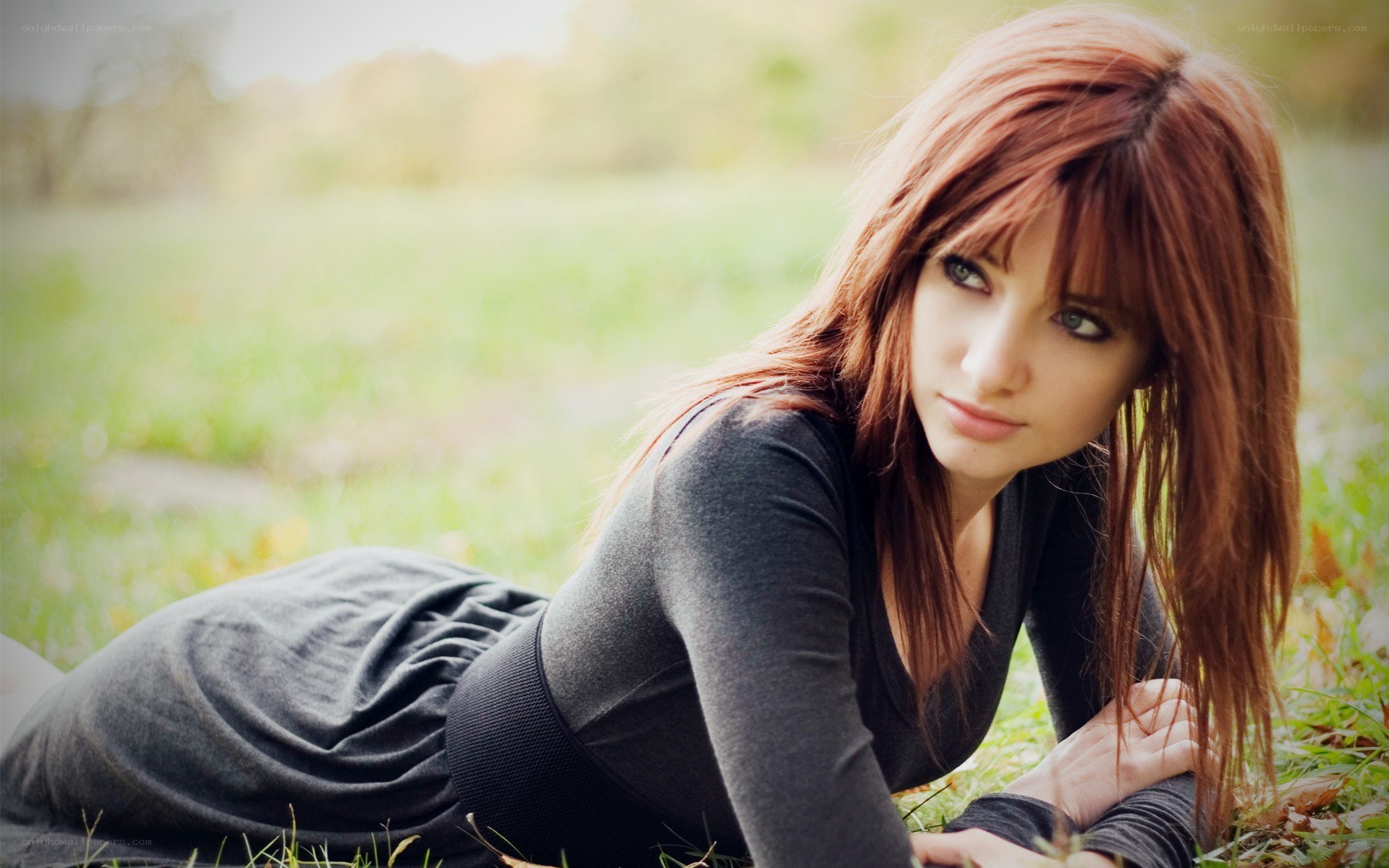 woman lying in grass
