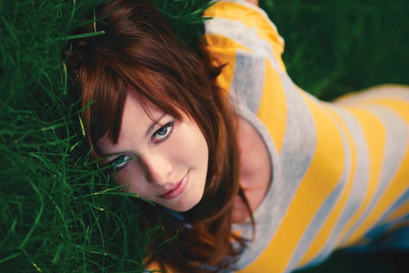 woman lying in grass
