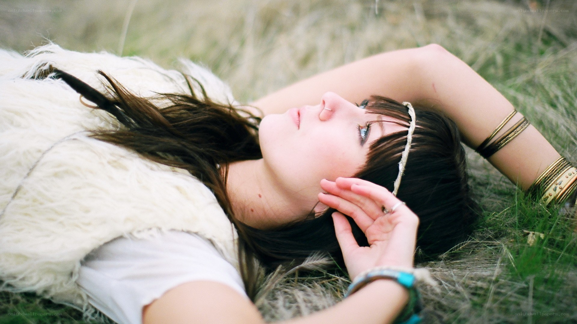 woman lying in grass