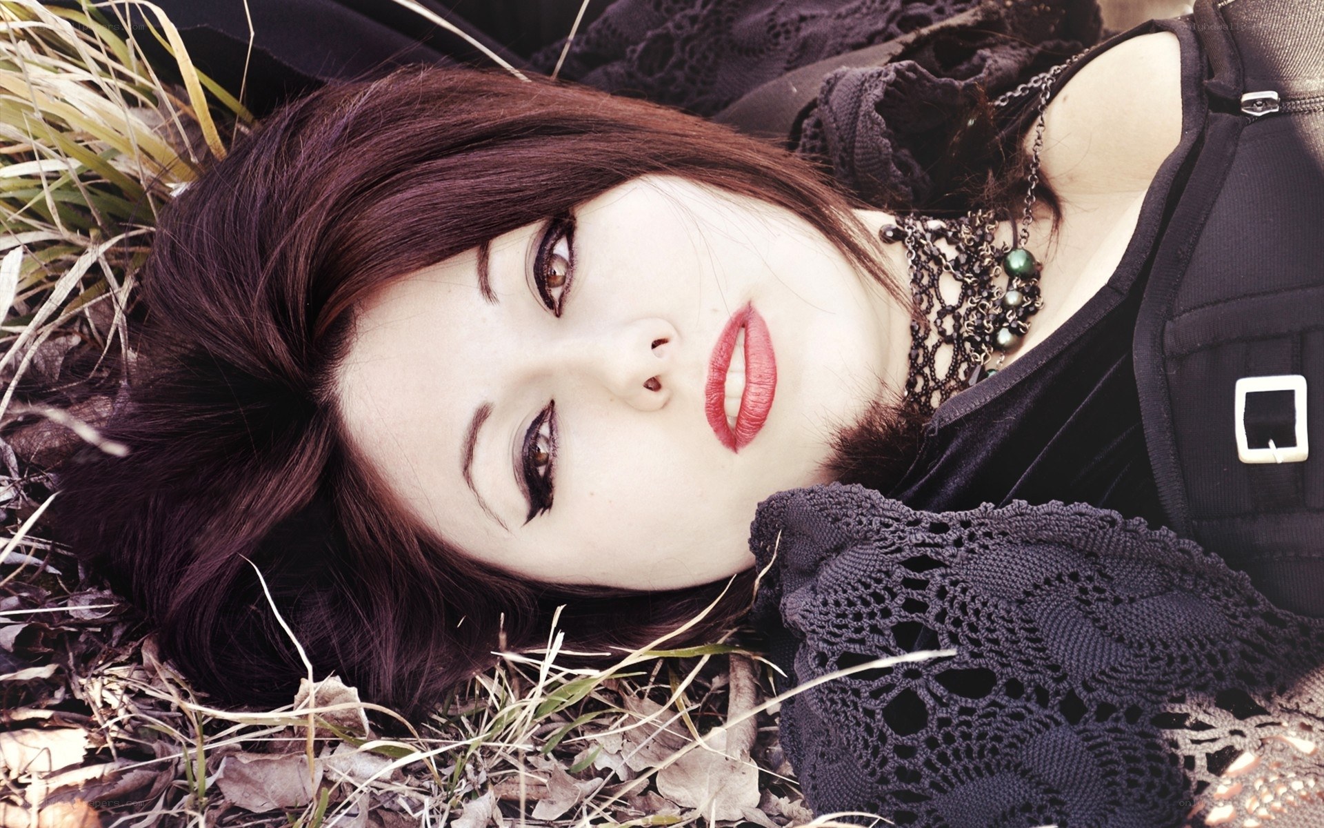 woman lying in grass