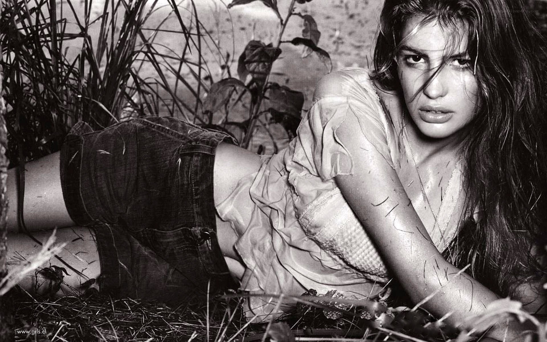 woman lying in grass