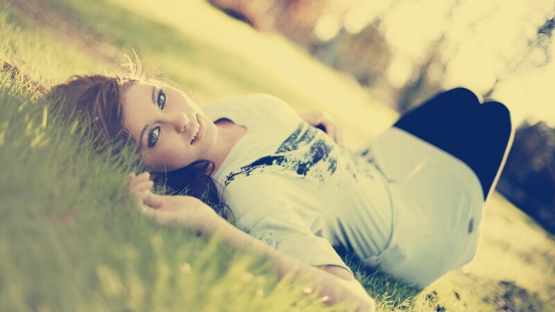 woman lying in grass