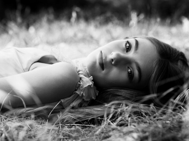 Woman Lying in Grass — Black, Calm