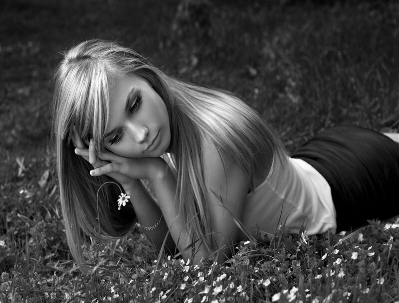 Woman Lying in Grass — Black, Contemplative, Photograph