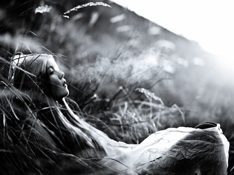 Woman Lying in Grass — Black, Serene, Afternoon, Photograph