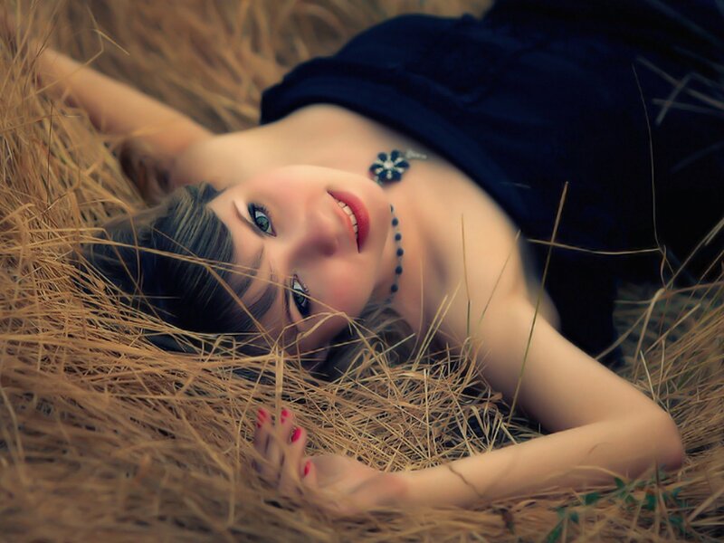 Woman Lying in Grass — Brown, Peaceful